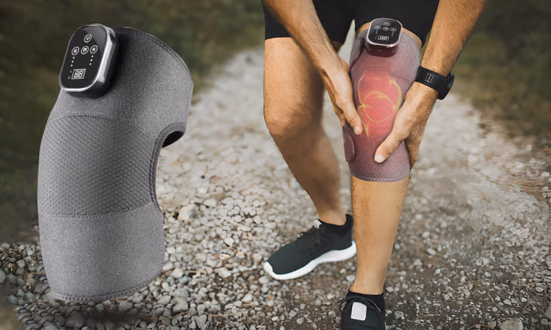 man with knee pain wearing a knee brace during outdoor activ