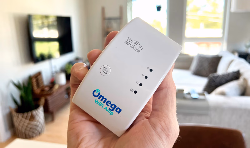 omega wifi amp held in hand