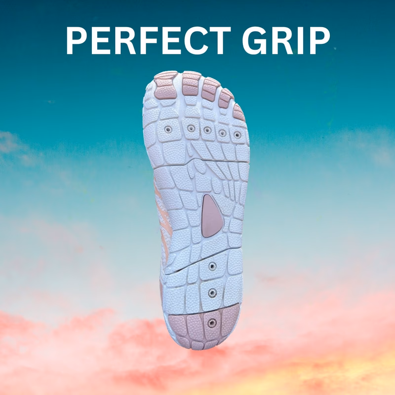sole of a white peak footwear shoe with text perfect grip