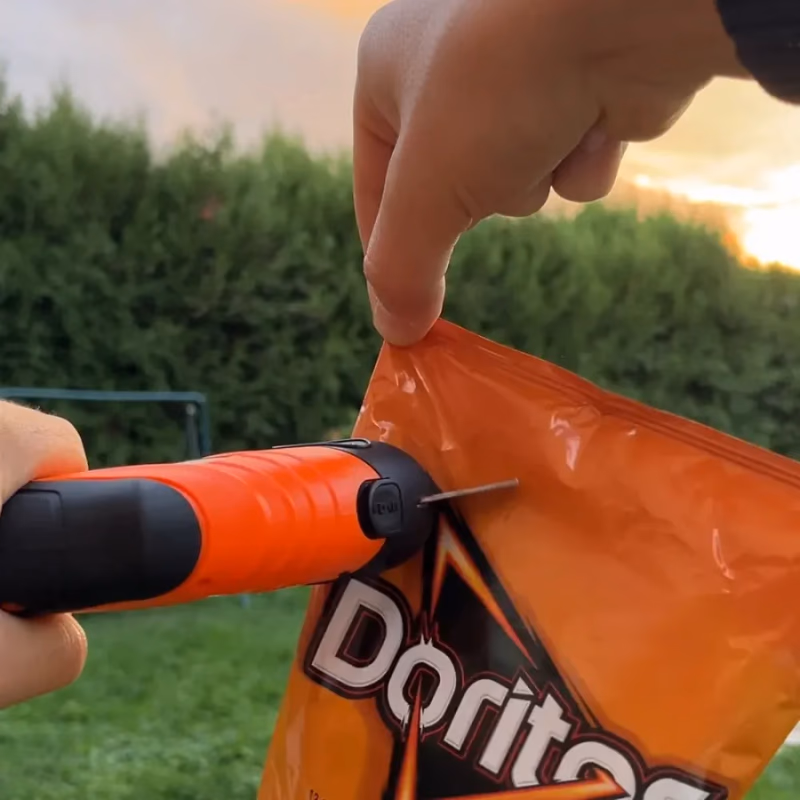 superscissor cutting doritos bag