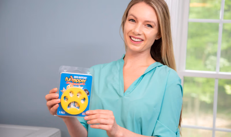 woman holding furzapper package