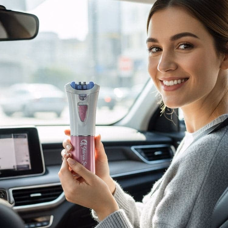 woman in car holding pink hair removal device