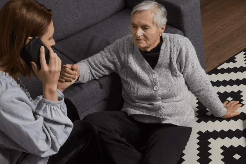 woman on phone with elderly person